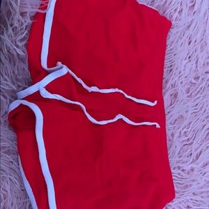 red shorts